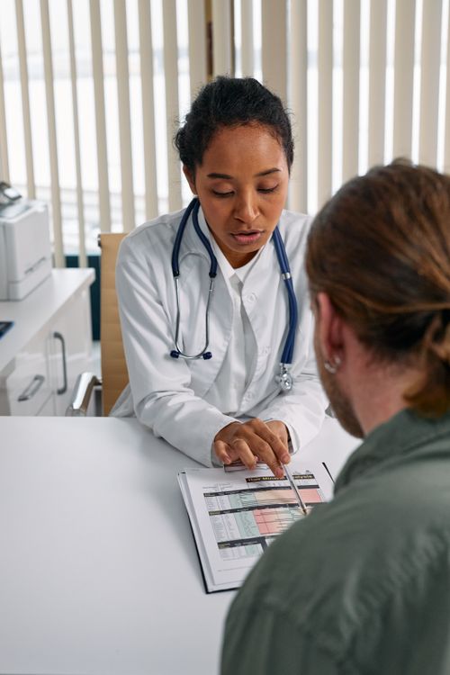 A patient speaking with a healthcare professional