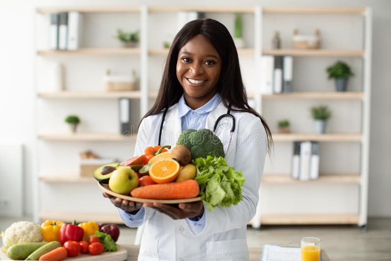 Healthcare professional sharing fresh produce